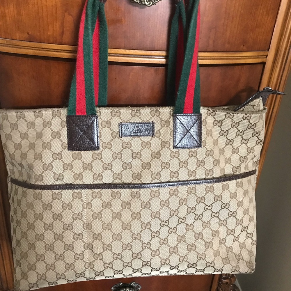 Gucci diaper bag with changing pad